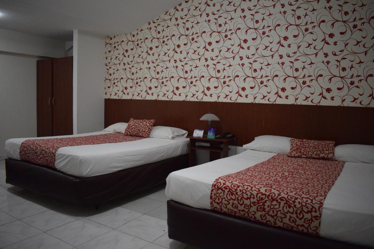 Hotel Zandu Pereira Buitenkant foto